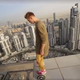 Illustration for article titled Fuck Everything About This Video Of A Dude Hoverboarding Along The Edge Of A Tall Building